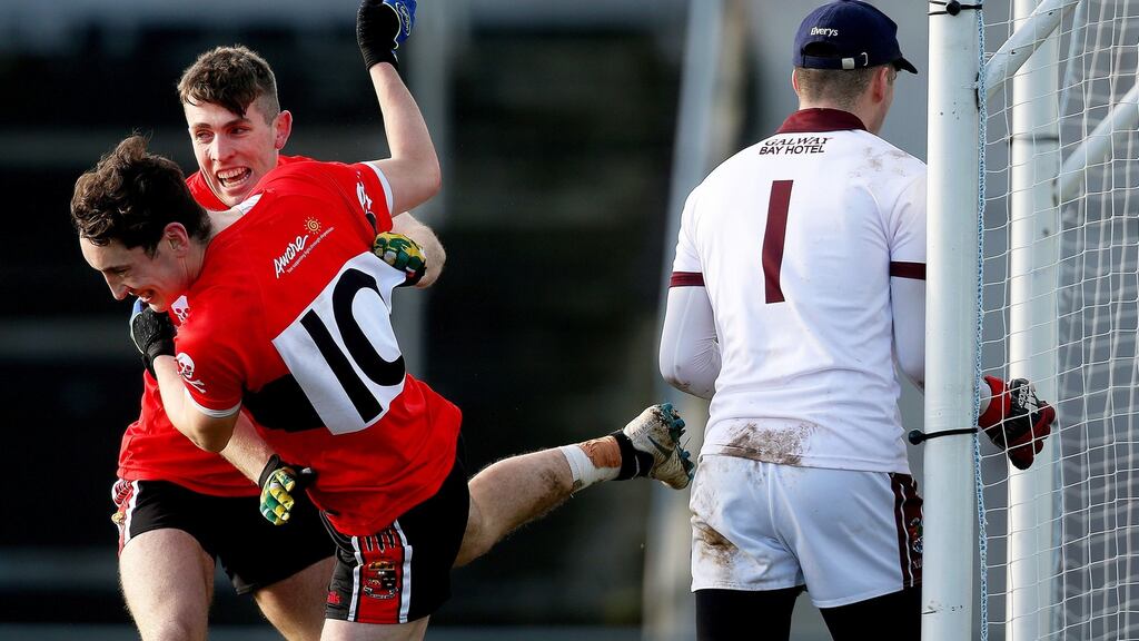 UCC’s Conor Geaney celebrates scoring a goal with Padraig Clifford during their Sigerson Cup semi-final win over NUIG. Photo: Oisin Keniry/Inpho
