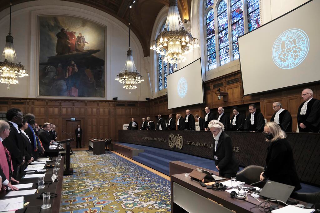 Judges and parties stand at the opening of the hearings at the International Court of Justice in The Hague, Netherlands. Photograph: Patrick Post/AP
