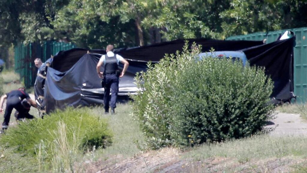 Police investigators continue to work at the scene of a suspected Islamist attack, outside the Air Products factory in Saint-Quentin-Fallavier. Photograph: Maxime Jegat/EPA