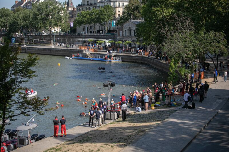 People in the waters of the Seine river after it was made clean in time for the 2024 Olympics. Photograph: Victoria Valdivia/Hans Lucas/Hans Lucas/AFP via Getty Images