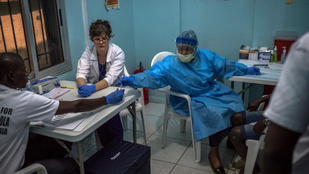 A nurse administers an Ebola vaccine as part of a study at Redemption Hospital, formerly a holding centre for the infected in Monrovia, Liberia. Photograph: Daniel Berehulak/The New York Times