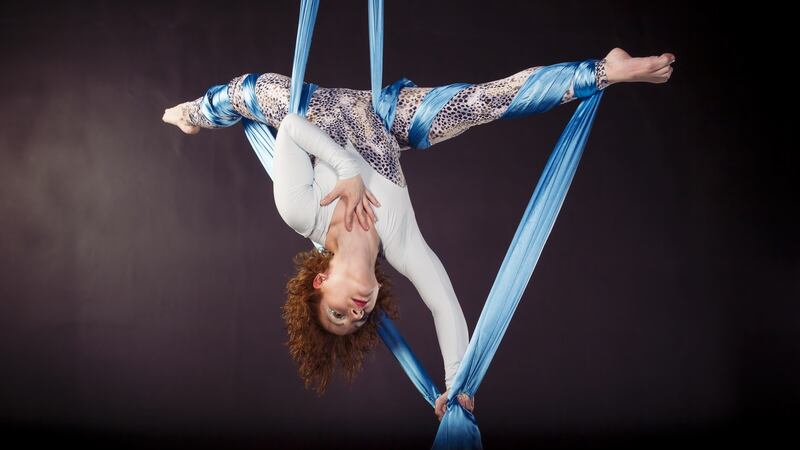 Aerial acrobatics: ‘You’re not too aware of the fact that you’re working out, it’s about the movements you want to try, so there is a nice balance of core work, strength-building and stretching, even some yoga-like movement, all without over thinking.’ Photograph: Thinkstock