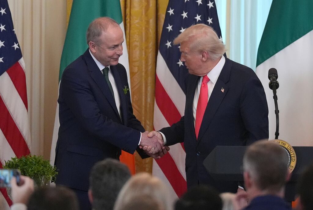 Taoiseach Micheál Martin and US president Donald Trump during the St Patrick's Day reception and traditional shamrock ceremony in the White House in Washington DC. Photograph: Niall Carson/PA Wire