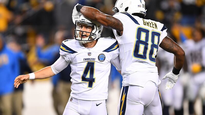 Mike Badgley and Virgil Green celebrate the game winning field goal which gave the Chargers a 33-30 win over the Pittsburgh Steelers. Photograph: Joe Sargent/Getty