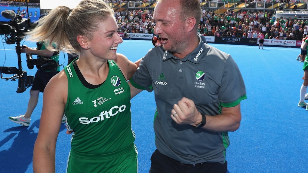 Chloe Watkins of Ireland and coach Graham Shaw celebrate their victory in the Women’s Hockey World Cup semi-final game between Ireland and Spain on Saturday. Photograph: Christopher Lee/Getty Images