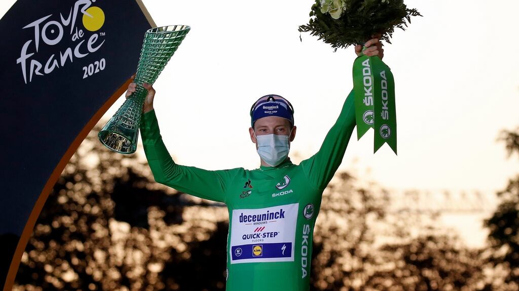 Irish rider Sam Bennett celebrates winning the best sprinter’s green jersey during the award ceremony at the end of the 2020 Tour de France. Photograph: EPA