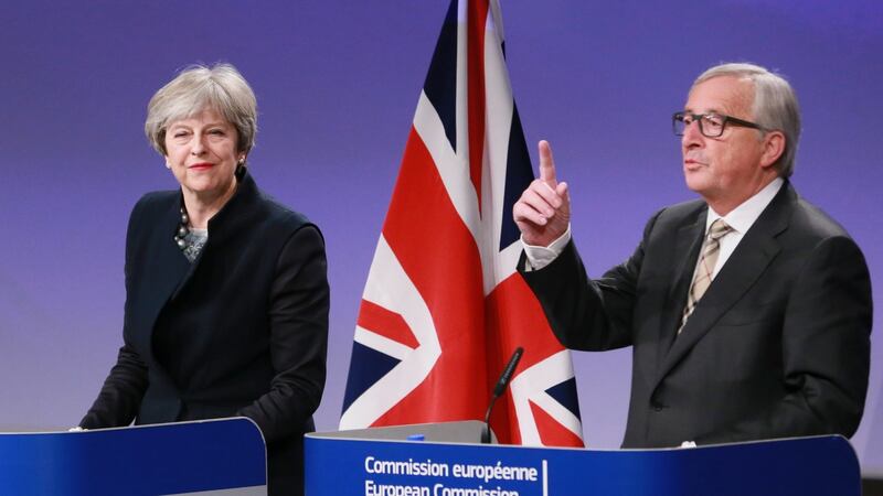 British prime minister Theresa May and European Commission president Jean-Claude Juncker give a press briefing after a meeting in Brussels. Photogrpaph: Olivier Hoslet/EPA