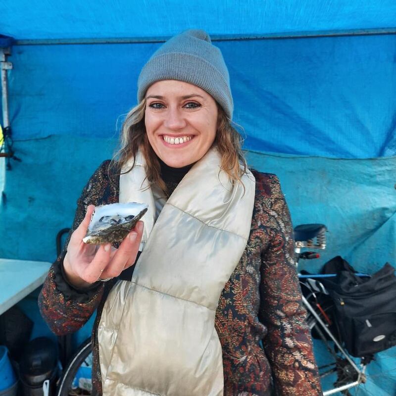Sheena Dignam eating an oyster on one of her Galway Food Tours