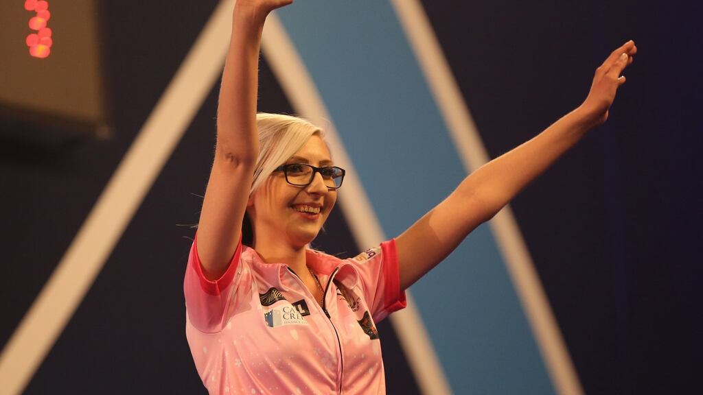 Fallon Sherrock reacts after beating world number 11 Mensur Suljovic in the second round of the PDC World Championship at Alexandra Palace in London. Photograph: Luke Walker/Getty Images