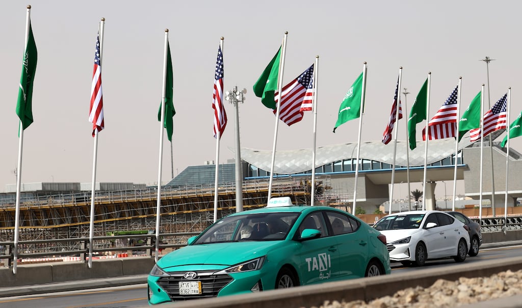 A street is decorated with the flags of Saudi Arabia and the US ahead of the US president's visit, in Riyadh, Saudi Arabia. Photograph: Ali Haider/EPA