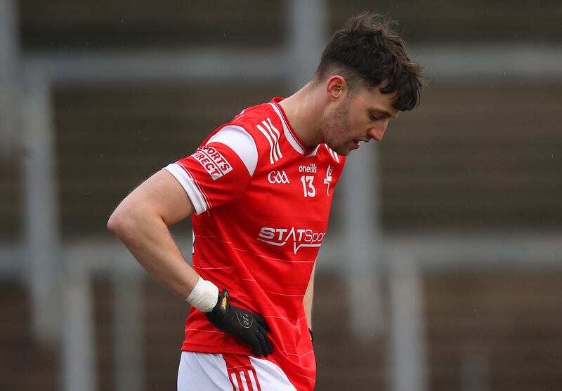 Peter McStravick dejected after Louth's defeat to Cavan in round three. Photograph: Leah Scholes/Inpho