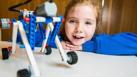 Video: Kids gear up to build moving Lego robot