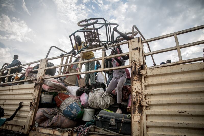 A wheelchair is unloaded from a truck that has transported Sudanese refugees and South Sudanese returnees to Renk from the Joda border crossing in South Sudan. Photograph: Sally Hayden