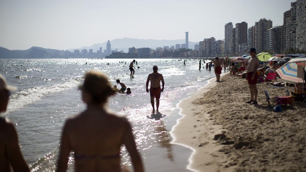Hitting the beach in Benidorm, Spain. The majority of Irish holidaymakers are expected to head for European sunspots. File photograph: Bloomberg