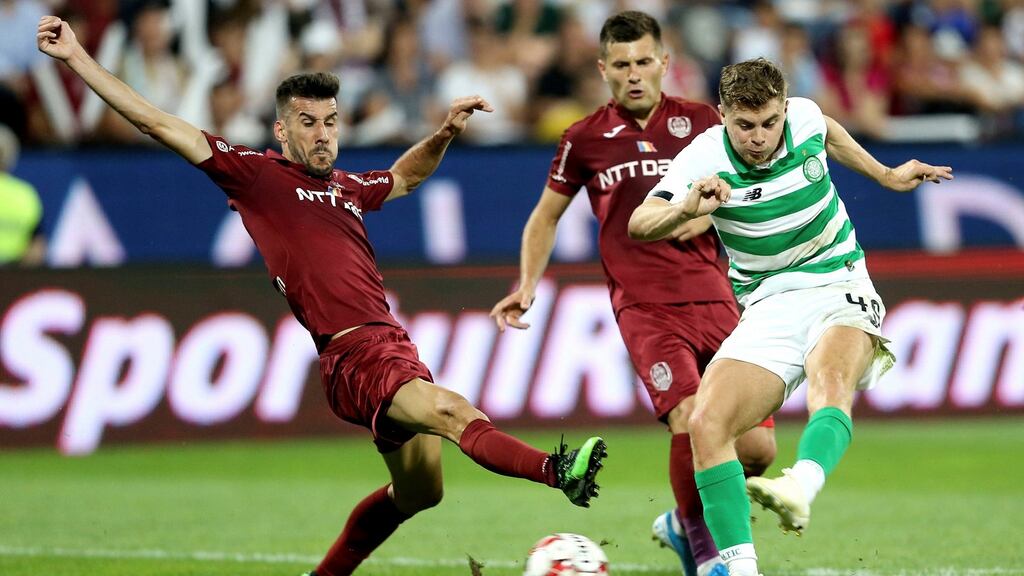 Celtic’s James Forrest scores during the Champions League third qualifying round, first leg against CFR Cluj at the Constantin Radulescu stadium. Photograph: Mircea Rosca/AP
