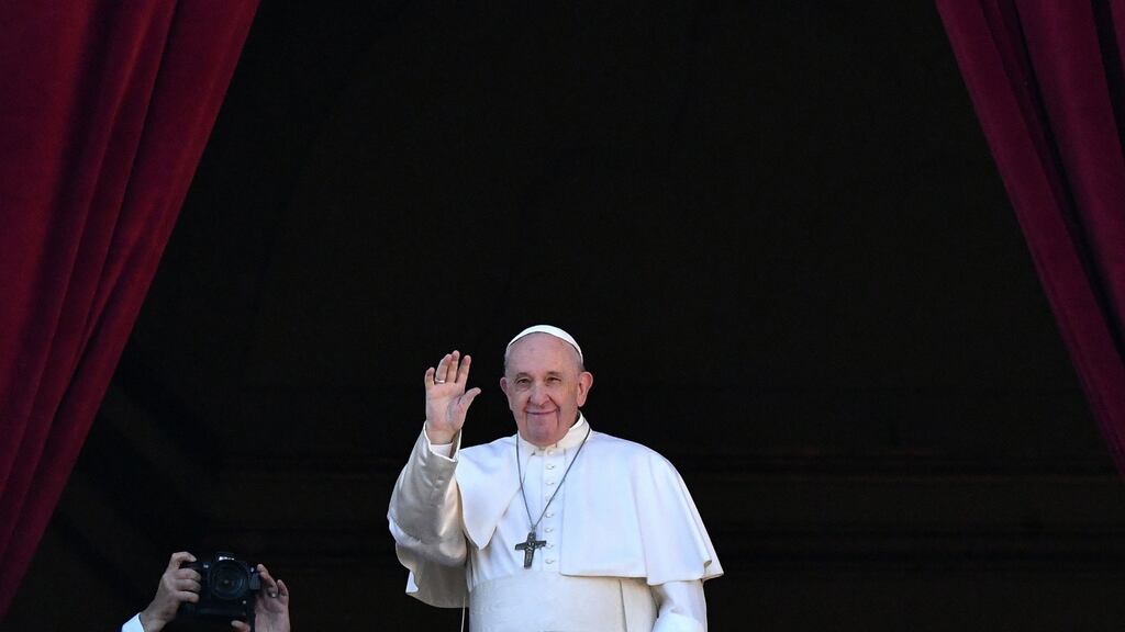 Pope Francis waves from the balcony of St Peter’s basilica during the traditional “Urbi et Orbi” Christmas message to the city and the world, on December 25th, 2019 at St Peter’s square in Vatican. Photograph: Alberto Pizzoli / AFP/ Getty Images