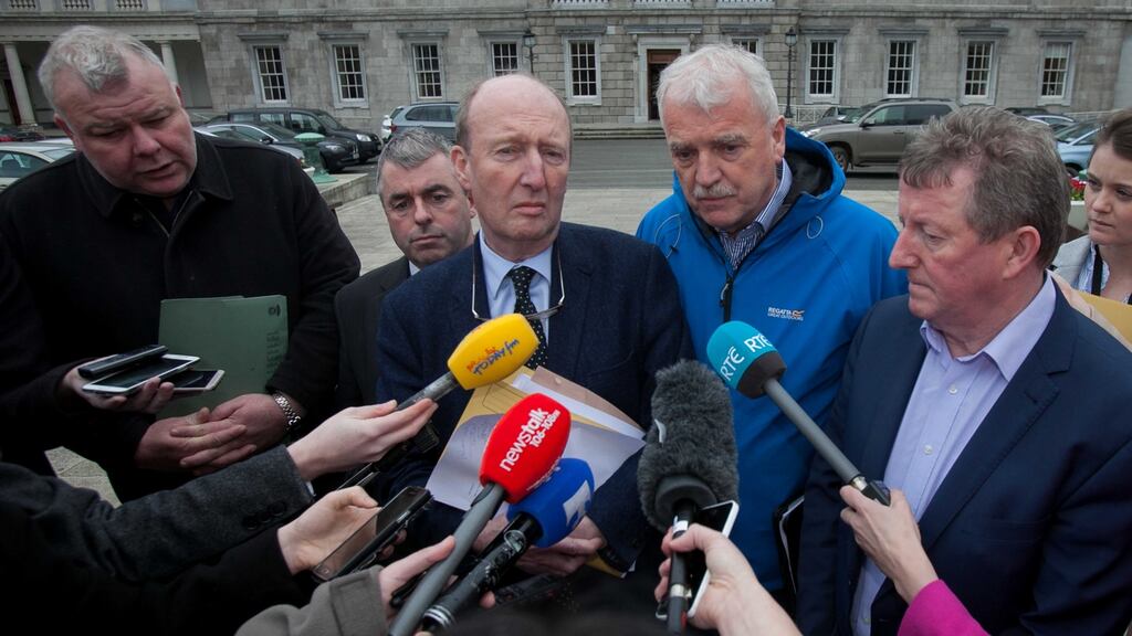 Members of the Independent Alliance (from left) Micheal Fitzmaurice, Kevin ‘Boxer’ Moran, Shane Ross, Finian McGrath, Sean Canney speak to reporters at  Leinster House after meeting Micheál Martin. Photo: Collins
