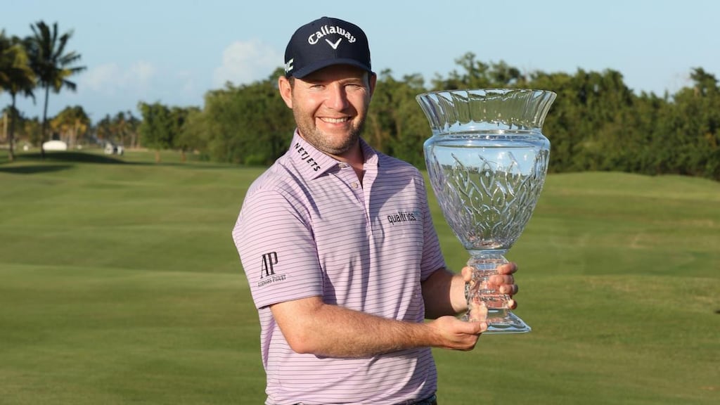 South Africa’s  Branden Grace  holds the winner’s trophy after his victory at  the Puerto Rico Open at Grand Reserve Country Club. Photograph: Andy Lyons/Getty Images