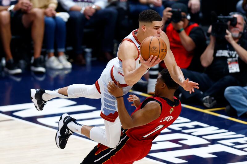 Michael Porter Jr of the Denver Nuggets drives to the basket against Kyle Lowry of the Miami Heat during the first quarter in Game Five of the 2023 NBA Finals at Ball Arena in Denver, Colorado. Photograph: Justin Edmonds/Getty Images