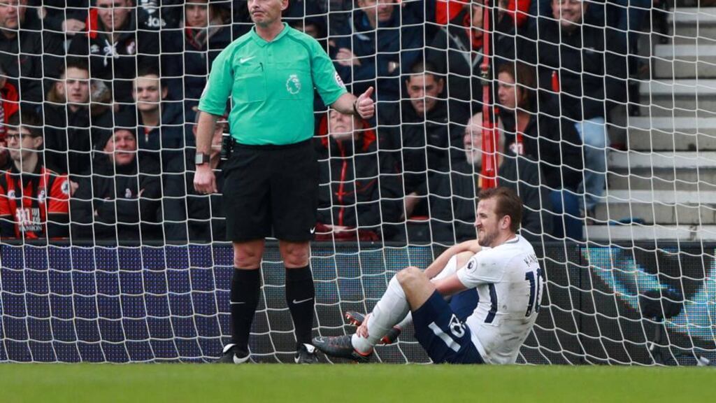 Tottenham’s Harry Kane sustains an injury after having a goal disallowed in their win over Bournemouth. Photo: Ian Walton/Reuters