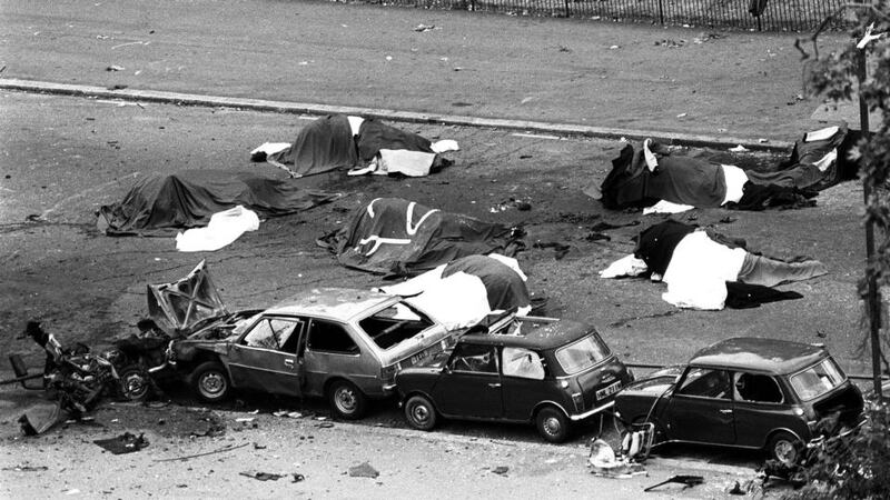 Dead horses covered up and wrecked cars at the scene of an IRA attack in Rotten Row, Hyde Park. Photograph: PA News/PA Wire