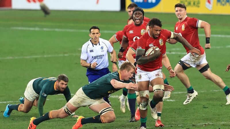Courtney Lawes goes past Pieter-Steph du Toit during the first Test in Cape Town. Photograph: David Rogers/Getty Images