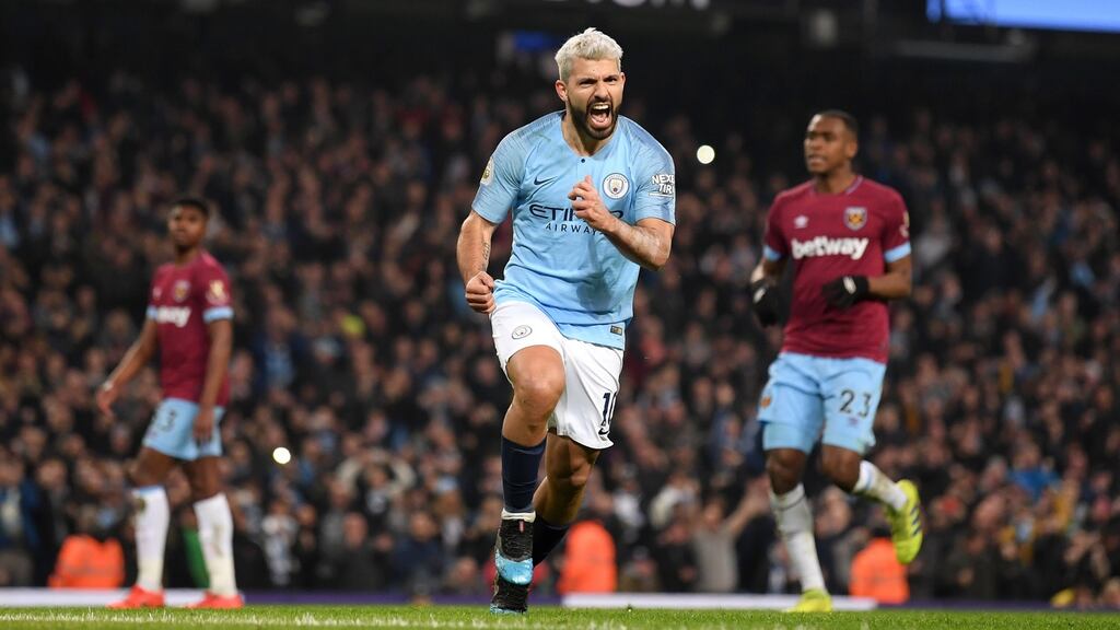Sergio Agüero  celebrates after scoring a penalty for Manchester City  during the Premier League match against West Ham at the Etihad stadium. Photograph: Laurence Griffiths/Getty Images