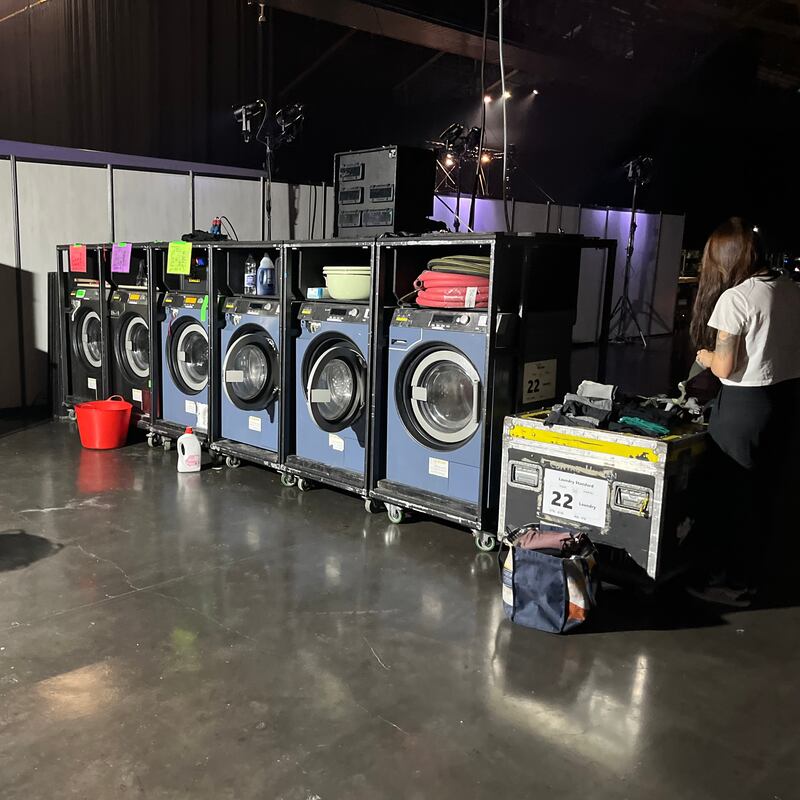The mini travelling laundromat backstage washing all the costumes before and during the show. Photograph: Deirdre Falvey