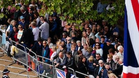 Queen Elizabeth’s coffin makes way through London