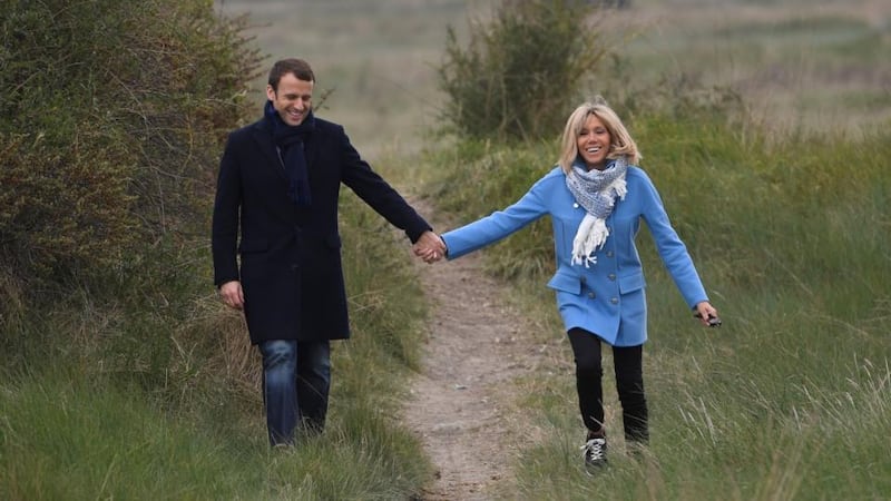 “A mixture of Gallic logic and alpha-male charm”: Emmanuel Macron with his wife, Brigitte Trogneux. Photograph: Eric Feferberg/AFP/Getty
