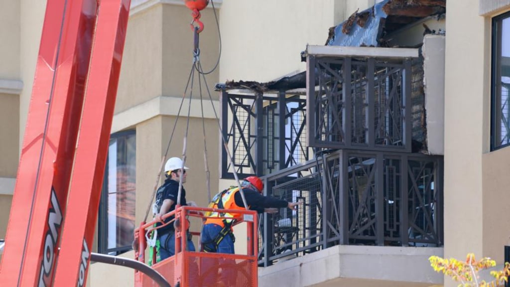Inspectors get a closer look at a damaged balcony that collapsed at Library Gardens Apartments in downtown Berkeley, California killing six students. Photograph: Jim Wilson/The New York Times