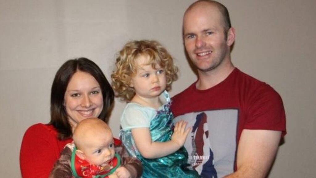 Charlie McCarthy pictured with his wife and children. File photograph: Facebook