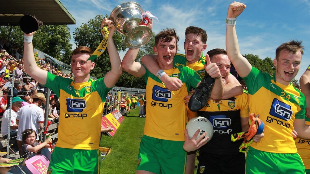 Donegal players celebrate their Ulster minor title win after beating Derry in the final in Clones. Photograph: Inpho