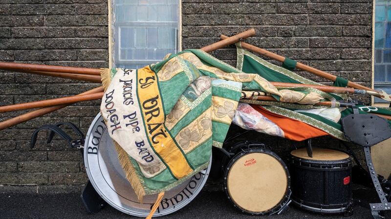 Achill pipe band flags and drums lined up outside during Mass. Photograph: Michael McLaughlin