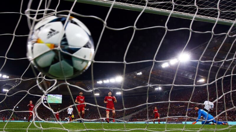 Liverpool’s Sadio Mane scores their first goal during the Champions League semi-final second leg against Roma at Stadio Olimpico in Rome. Photograph: Tony Gentile/Reuters