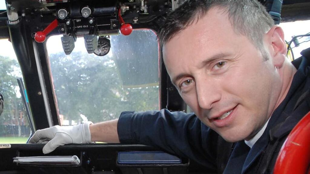 Capt Mark Duffy on the flight deck of a Coast Guard helicopter
