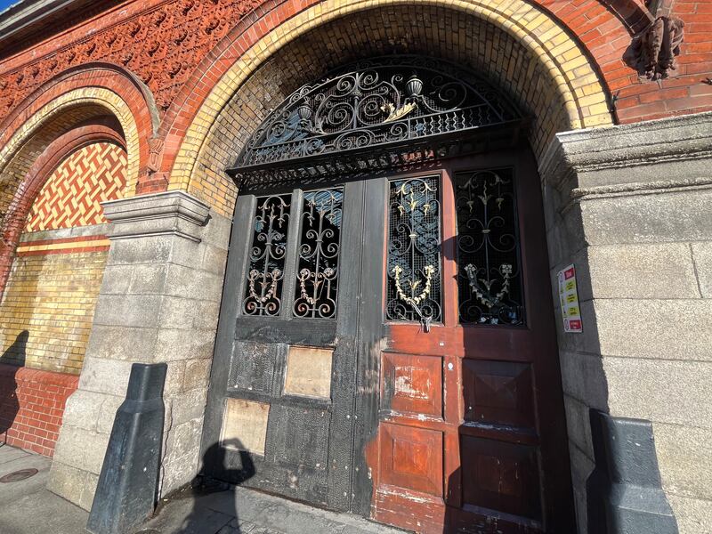 Fire damage to the doors of the market in Smithfield. Photograph: Olivia Kelly