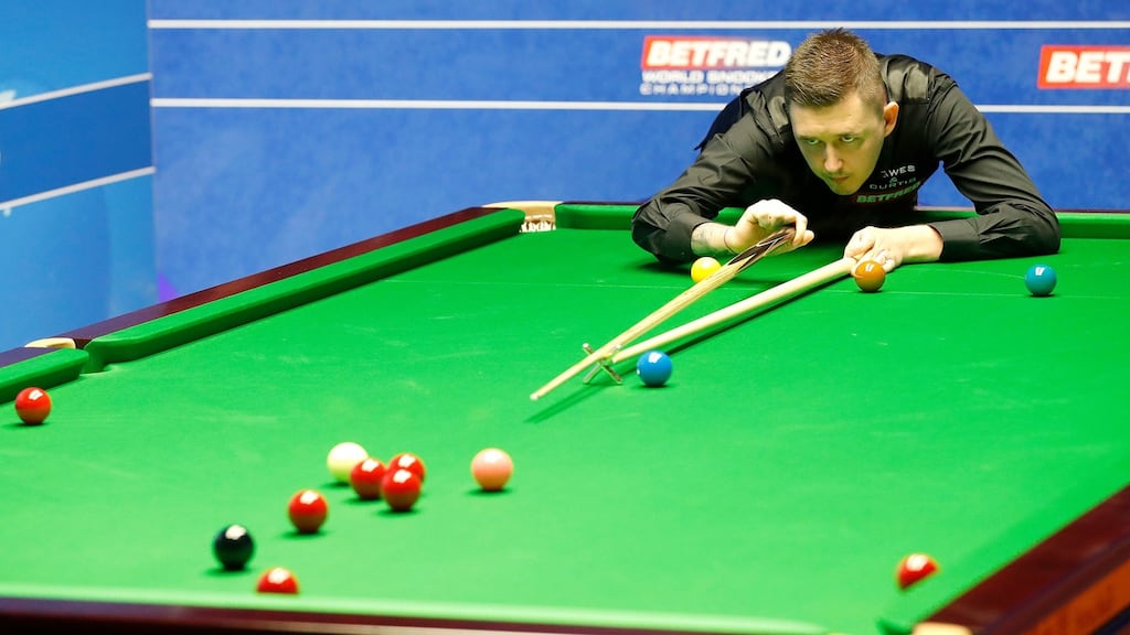 Kyren Wilson on his way to winning his quarter-final match against Mark Allen at the World Championship at The Crucible in Sheffield. Photograph: Martin Rickett/PA Wire