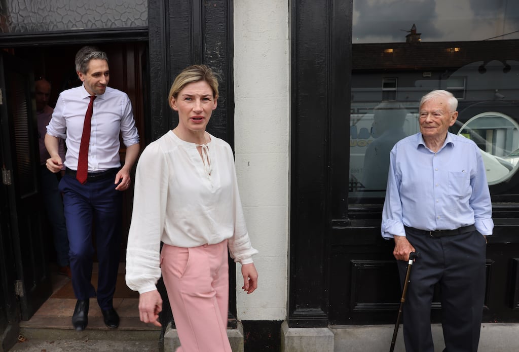 Nina Carberry, who is running in the European elections in Midlands North-West, canvassing with Taoiseach Simon Harris and former councillor Willie Carey in Enfield, Co Meath. Photograph: Dara Mac Dónaill