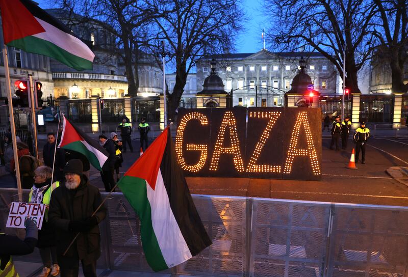 A large installation that simply read “Gaza” in bright lights against a black backdrop was set up in front of the gates of the parliament. Photograph: Dara Mac Donaill