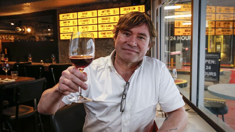 John Farrell in his new wine bar, Amy Austin.