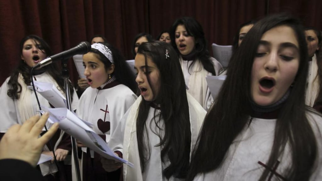 Catholic Iraqis attend Mass. Christians “face persecution in over 100 countries”. Photograph: Reuters/Ali Jarekji