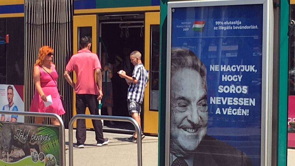 Hungarian government poster that reads “Don’t let George Soros have the last laugh”, in Budapest. Photograph: Krisztina Than/Reuters