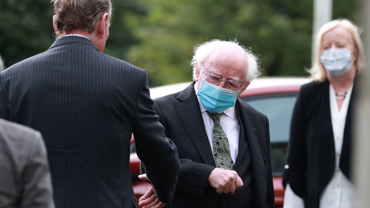 Former Stormont first minister Lord David Trimble greets President Michael D Higgins during the funeral of Pat Hume. Photograph: Liam McBurney/ PA