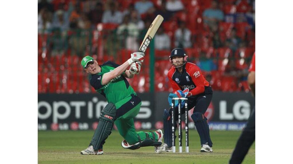 Kevin O’Brien bludgeons another six during his record-breaking innings against England today. Photograph: Tom Shaw/Getty Images