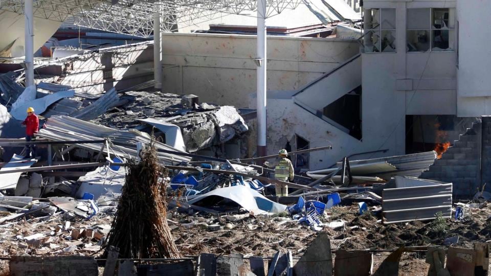 Rescue workers are seen at the site of an explosion at a maternity hospital in Mexico City. Photograph: Reuters