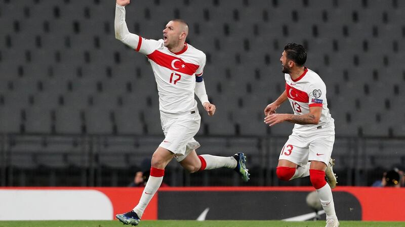 Burak Yilmaz celebrates after completing his hat-trick and scoring Turkey’s fourth goal during the World Cup qualifier against the Netherlands at the Ataturk Olympic Stadium in Istanbul. Photograph: Murad Sezer/AFP via Getty Images