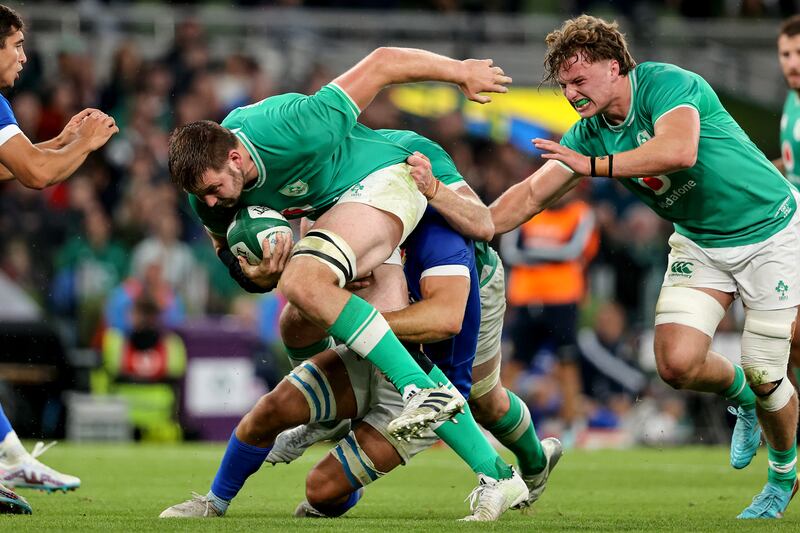 Ireland's Iain Henderson carries with Cian Prendergast in support during the game against Italy. Photograph: Ben Brady/Inpho