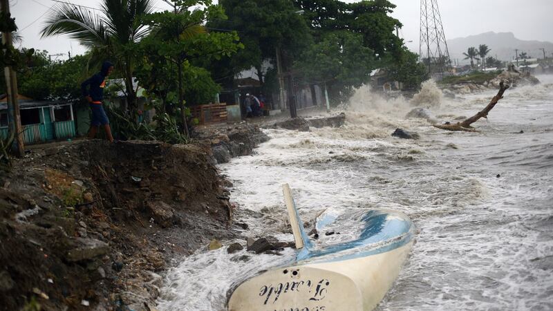 Waves crash against the shore and a stranded boat as Hurricane Irma moves off from the northern coast of the Dominican Republic, in Puerto Plata, Dominican Republic September 7, 2017. Photograph: Reuters/Ivan Alvarado