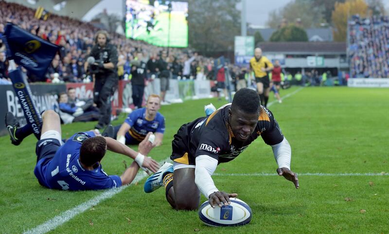 Wasps’ Christian Wade scores a a winger’s try despite the attention of Leinster’s Zane Kirchner and Darragh Fanning. Photograph: Morgan Treacy / Inpho